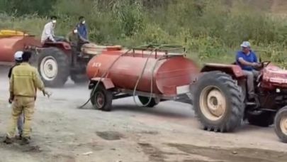 Patlak lastiği ile yangına müdahale eden kahraman çiftçi